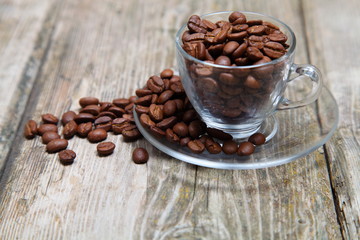 Ñup of coffee on a wooden background