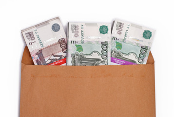 Пачки российских рублей в конверте
