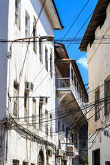 Fototapeta na wymiar Electricity cable tangled in an old colonial street