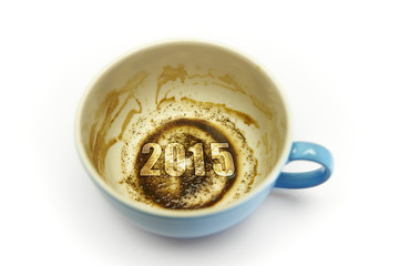 coffee cup with coffee grounds & 2015