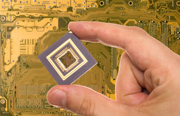 Microprocessor in hand over printed circuit board