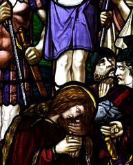 Mary Magdalene with the cross in stained glass