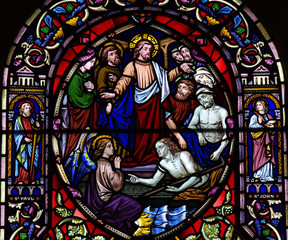 Jesus and the resurrection of people in stained glass