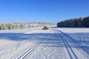 Fototapeta na wymiar Winter landscape and trails for skiers