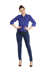 Fototapeta premium Portrait of a beautiful woman in blue jeans and blue shirt