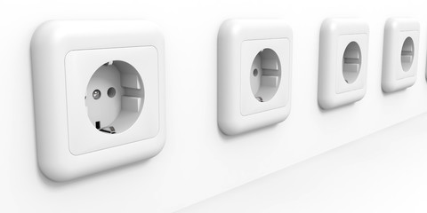 White electric sockets at the wall