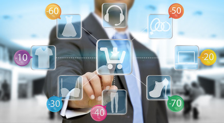 Businessman using digital interface to shop online