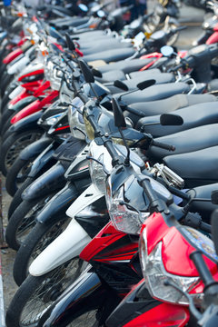 Many motorbikes on street parking