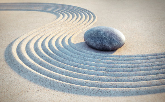 Stein und Linien im Sand
