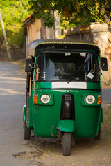 Green rickshaw, front view