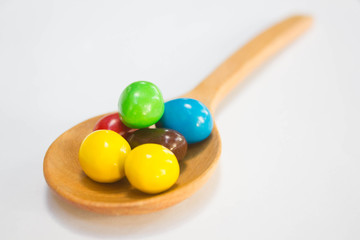 Colorful of Chocolate ball on wooden spoon