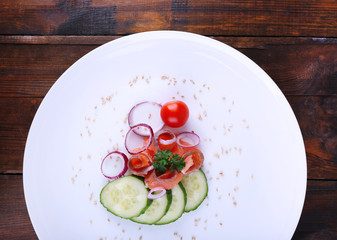 Fresh fish salad with vegetables