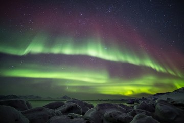 Beautiful Northern Lights over the Arctic frozen fjord © Incredible Arctic