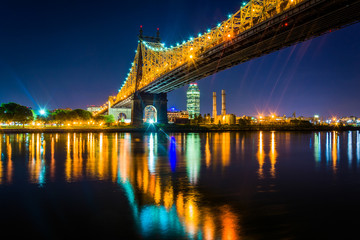 Fototapeta na wymiar The Queensboro Bridge at night, seen from Roosevelt Island, New