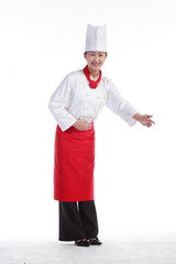 스튜디오 안의 빨간 앞치마를 한 여자 요리사