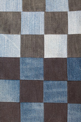 background of squares sewn denim
