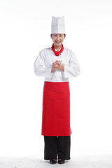 스튜디오 안의 빨간 앞치마를 한 여자 요리사