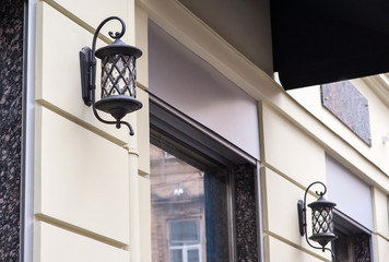 Fototapeta na wymiar beautiful forged lantern outdoors in the city of Lviv