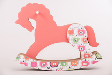 Child with the toy horse