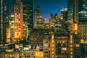 View of buildings in the Turtle Bay neighborhood at night, from