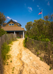 Fototapeta na wymiar Sand path to a house in Ocean City, New Jersey.