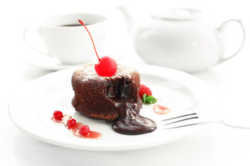Hot chocolate pudding with fondant centre on plate, close-up