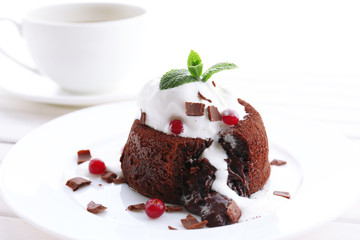 Hot chocolate pudding with fondant centre with ice-cream,