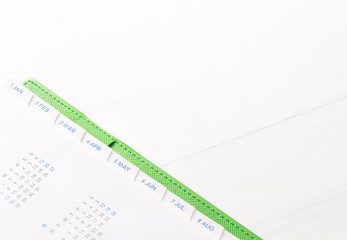 Calendar.On Blank desk.