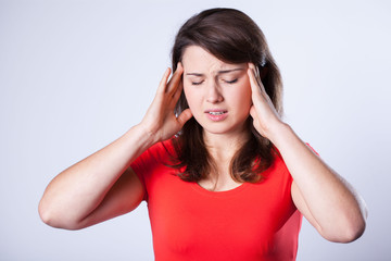 Woman suffering from headache