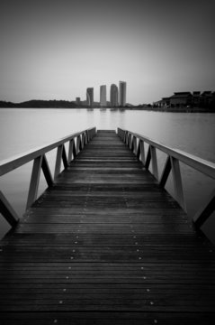 Black and white wooden jetty. © miracoure