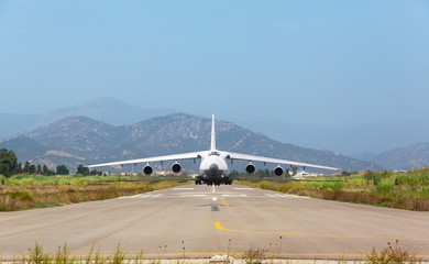 Fototapeta na wymiar White heavy cargo jet