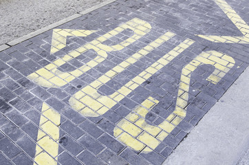 Bus signal on asphalt