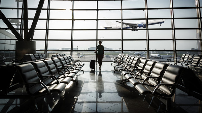 Beautiful Young Woman At The Airport