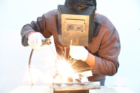 worker welding steel .
