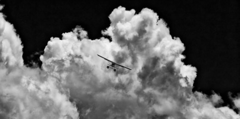 Seaplane in stormy skies above Sydney, Australia