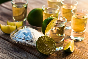 gold tequila with salt and lime