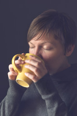 Beautiful Woman Drinking Hot Chocolate in the morning