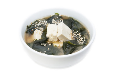 Japanese soup with herbs and cheese on white background