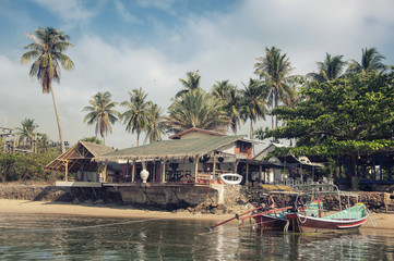 Hut at the beach with boats