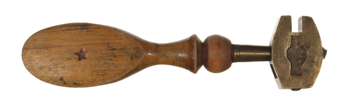 Old diamond glass cutter with wooden handle isolated on white ba