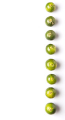 Calamondin or calamansi lime over white background