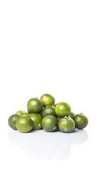 Calamondin or calamansi lime over white background