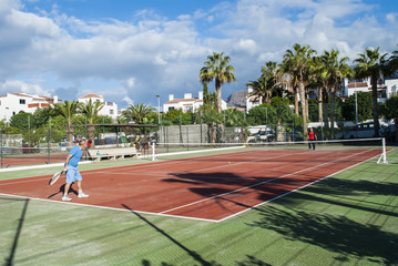 Playing tennis 
