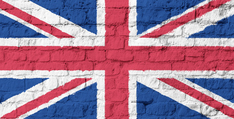 The United Kingdom flag on brick wall background