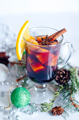 Hot red mulled wine isolated on white background