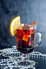 Hot red mulled wine isolated on white background