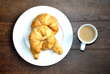 Top view of croissants and coffee