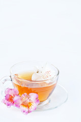 cup of tea with  flowers