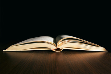 Book on wooden table