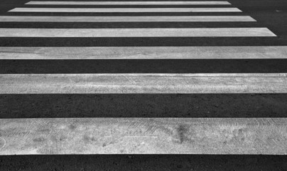 Zebra pedestrian crossing as urban background image.